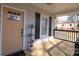 Inviting front porch with a welcoming doormat, perfect for enjoying a morning coffee or evening relaxation at 305 E Henry St, Belmont, NC 28012