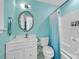 Well-lit bathroom with vanity, toilet, and shower at 327 Saint Andrews Rd, Statesville, NC 28625