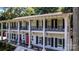 Impressive home boasts a symmetrical design, complete with a second-story balcony at 327 Saint Andrews Rd, Statesville, NC 28625