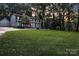 Spacious home with lush green lawn, perfect for outdoor enjoyment at 327 Saint Andrews Rd, Statesville, NC 28625