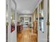 Through doorway revealing home office with fireplace, built-in bookshelves, and hardwood floors at 327 Saint Andrews Rd, Statesville, NC 28625