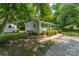 Exterior of home from the backyard featuring the siding and a storage shed at 3724 Patricia Nw Dr, Concord, NC 28027