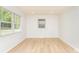 Bright bedroom featuring new flooring, fresh paint and natural light from two windows at 3724 Patricia Nw Dr, Concord, NC 28027