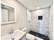 Bathroom featuring marble tiled shower and floors, modern vanity and fixtures at 419 Lige St, Rock Hill, SC 29730