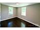 Cozy bedroom with hardwood floors and natural light from dual windows at 419 Lige St, Rock Hill, SC 29730
