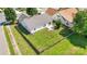 A spacious, fenced backyard with a well-maintained lawn and small patio at 4697 Madeline Dr, Rock Hill, SC 29732