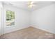 Bright bedroom featuring neutral carpet, ceiling fan, and a window with blinds at 4697 Madeline Dr, Rock Hill, SC 29732