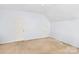 Attic bedroom featuring carpet, two doors, and neutral colored walls at 5238 Downing Creek Dr, Charlotte, NC 28269