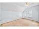 Attic bedroom featuring carpet, small window, and neutral colored walls at 5238 Downing Creek Dr, Charlotte, NC 28269