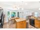 Bright eat-in kitchen features a dining table and view of the deck at 5238 Downing Creek Dr, Charlotte, NC 28269