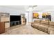 Bright living room showcases hardwood floors, cabinets, and a comfortable sofa at 5238 Downing Creek Dr, Charlotte, NC 28269
