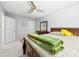 This bedroom has a ceiling fan, carpeted floors, and a dresser with mirror at 5302 Fairgrove Ln, Harrisburg, NC 28075