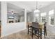 Cozy breakfast nook with lots of natural light offers a view of the living space at 5302 Fairgrove Ln, Harrisburg, NC 28075