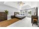 Spacious main bedroom with vaulted ceiling and plenty of light from multiple windows at 5302 Fairgrove Ln, Harrisburg, NC 28075