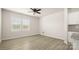 Bright living room featuring neutral paint, modern flooring and lots of natural light at 5337 Orchid Bloom Dr, Indian Land, SC 29707