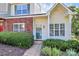 Charming home entrance with a well-manicured front yard at 5980 Cougar Ln, Charlotte, NC 28269