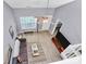 Loft living area with a ceiling fan, comfortable seating, and a TV for relaxation at 5980 Cougar Ln, Charlotte, NC 28269
