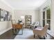Bright office with a large window, modern desk, and comfortable seating area at 610 Hampshire Hill Rd, Matthews, NC 28105