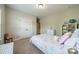 Bedroom with playful decor, featuring a whimsical bedspread and a cozy atmosphere at 6417 Loyola Ct, Mint Hill, NC 28227