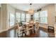 Dining area with natural light and hardwood floors at 6417 Loyola Ct, Mint Hill, NC 28227