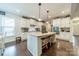 Bright kitchen featuring an island with seating, and stainless steel appliances at 6417 Loyola Ct, Mint Hill, NC 28227