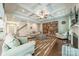 Spacious living room featuring coffered ceilings, hardwood floors, and an open layout at 6417 Loyola Ct, Mint Hill, NC 28227