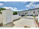 Townhouse backyard featuring a detached storage unit at 764 Atherton Way, Rock Hill, SC 29730