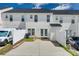 This townhouse offers a cozy backyard with a white fence and a detached storage unit at 764 Atherton Way, Rock Hill, SC 29730