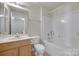 Bright bathroom featuring a vanity, toilet, and shower at 764 Atherton Way, Rock Hill, SC 29730