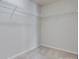 View of an empty walk in closet with wire shelving on the upper part of the walls at 764 Atherton Way, Rock Hill, SC 29730