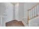 Welcoming entryway with hardwood floors, staircase and natural light at 764 Atherton Way, Rock Hill, SC 29730