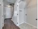 Hallway area features hardwood floors, staircase, closet space with wire rack, and entry to the front door at 764 Atherton Way, Rock Hill, SC 29730