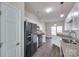 Well-lit kitchen with stainless steel appliances and a view into the living room area at 764 Atherton Way, Rock Hill, SC 29730