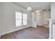 Bright living room featuring hardwood floors and large windows that provide plenty of natural light at 764 Atherton Way, Rock Hill, SC 29730