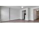 Spacious living area with hardwood floors, light walls, and an open doorway leading to the kitchen at 764 Atherton Way, Rock Hill, SC 29730