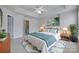 Cozy main bedroom features a trey ceiling, soft carpet, modern decor, and access to an ensuite bathroom at 764 Atherton Way, Rock Hill, SC 29730