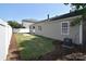 Manicured backyard with a newly installed fence, concrete patio, and healthy green lawn at 8655 Meadowmont View Dr, Charlotte, NC 28269