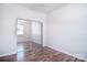 Bright bedroom featuring modern flooring and a closet with mirrored sliding doors at 8655 Meadowmont View Dr, Charlotte, NC 28269