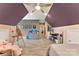 Bedroom with hardwood floors, unique ceiling, and natural light at 10007 Hillspring Dr, Huntersville, NC 28078