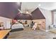 Bedroom with unique ceiling, hardwood floors, and natural light at 10007 Hillspring Dr, Huntersville, NC 28078