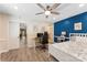 Bedroom with ceiling fan, walk-in closet, and dedicated desk workspace at 10007 Hillspring Dr, Huntersville, NC 28078