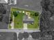 Aerial view of the property with lot lines, showcasing the spacious backyard and landscaping at 104 Nottingham Dr, Maiden, NC 28650