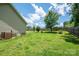 A fenced backyard with plenty of green grass at 104 Nottingham Dr, Maiden, NC 28650