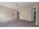 Spacious bedroom features neutral walls, plush carpeting, and access to a large closet at 104 Nottingham Dr, Maiden, NC 28650