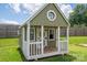 Charming playhouse with a porch, perfect for outdoor fun at 104 Nottingham Dr, Maiden, NC 28650