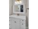 Bathroom vanity with white cabinets, a white countertop and gold fixtures at 106 Kelly Marie Ct, Kings Mountain, NC 28086