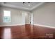 Spacious bedroom with dark hardwood floors and two bright windows offering ample natural light at 106 Kelly Marie Ct, Kings Mountain, NC 28086