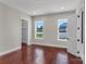 Bright bedroom with two windows, hardwood floors, and neutral paint at 106 Kelly Marie Ct, Kings Mountain, NC 28086
