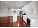 Bright kitchen featuring white cabinetry, stainless steel appliances, and a marble countertop island at 106 Kelly Marie Ct, Kings Mountain, NC 28086