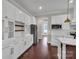 Kitchen area with marble countertops, stainless appliances, and white cabinetry with gold hardware at 106 Kelly Marie Ct, Kings Mountain, NC 28086